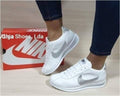 Nike Cortez Branco com Swoosh Prateado